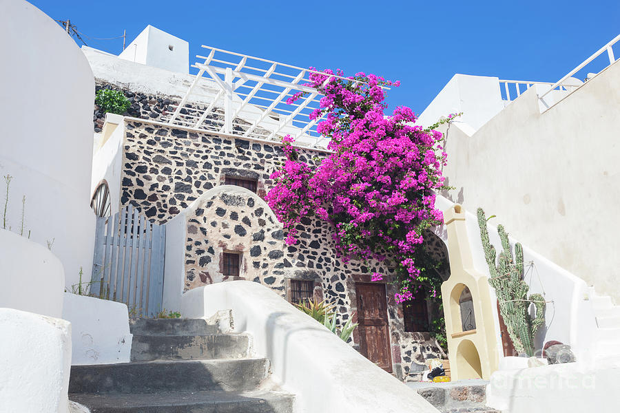 Traditional Greek whitewashed stone house, Santorini island, Greece. Photograph by Michal Bednarek