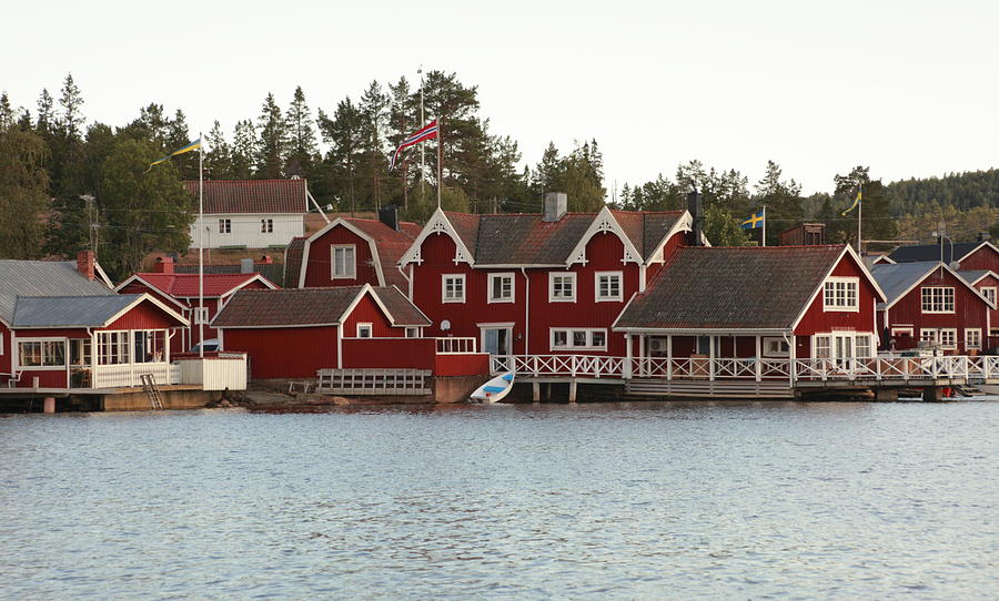 Traditional red boat house in Sweden Photograph by Ulrich Kunst And Bettina Scheidulin