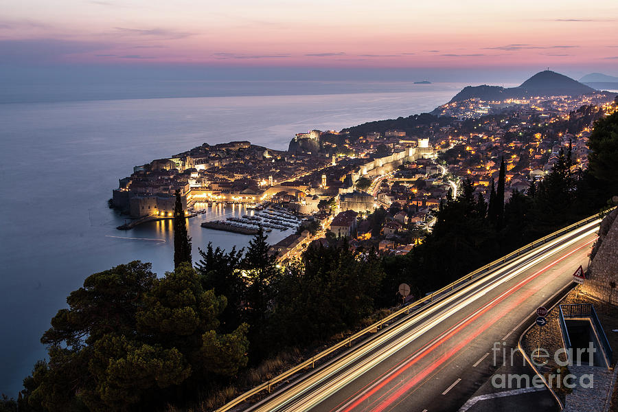 Traffic at night in Dubrovnik Photograph by Didier Marti