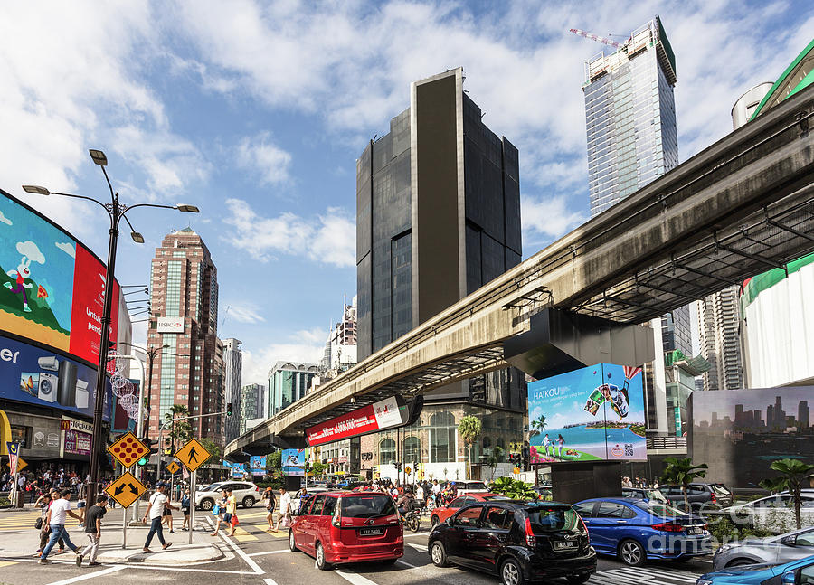 Traffic in Bukit Bintang in the heart of Kuala Lumpur, Malaysia  Photograph by Didier Marti