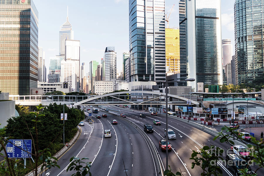 Traffic in Hong Kong Central district  Photograph by Didier Marti