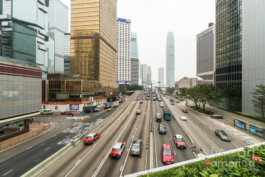 Traffic in the heart of Hong Kong island Central business and fi Photograph by Didier Marti