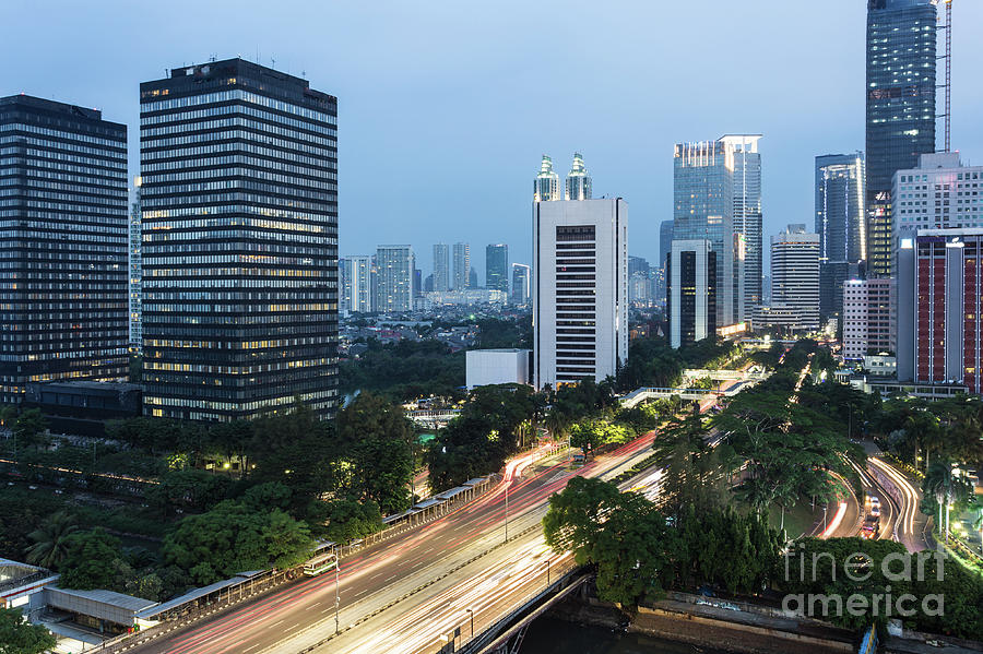 Traffic rush in Jakarta at night Photograph by Didier Marti