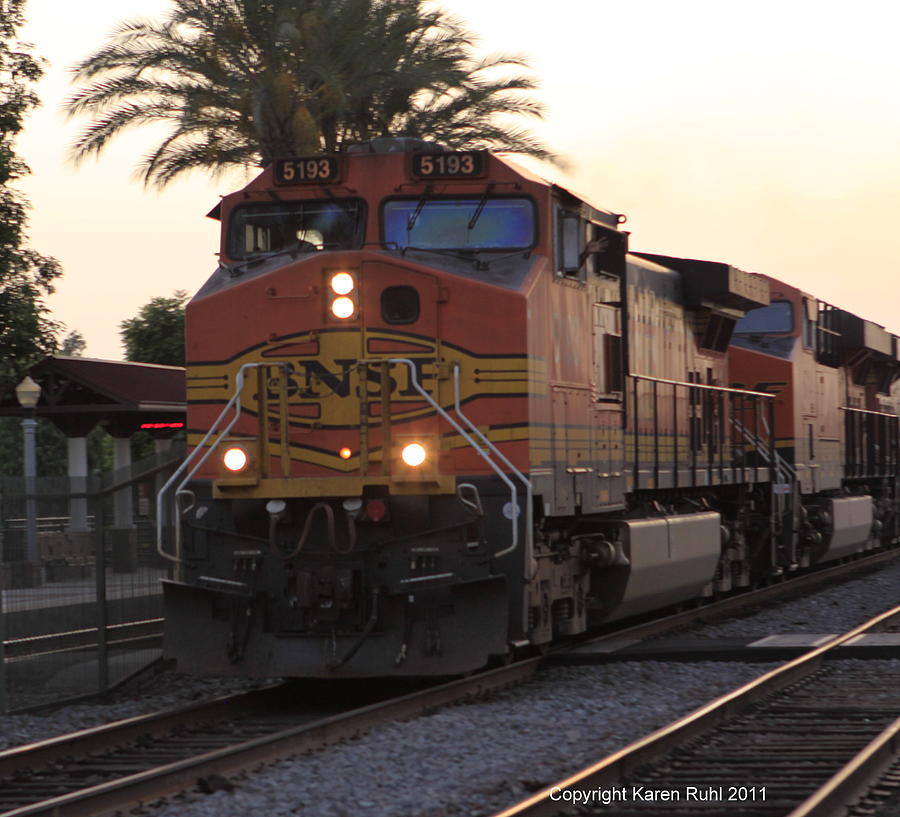 Train at sunset Photograph by Karen Ruhl