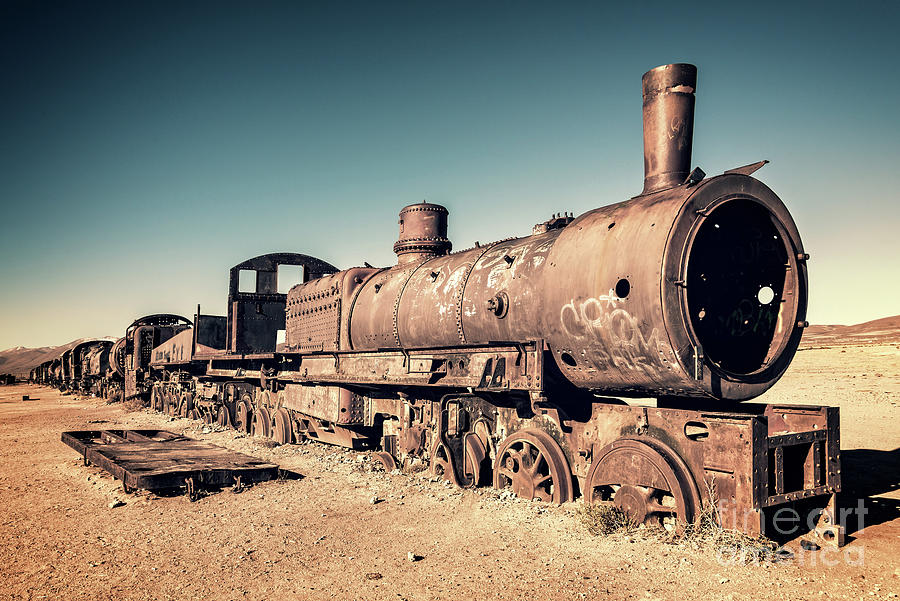 Train Photograph - Train Cemetery In Uyuni, Bolivia by Delphimages Photo Creations Train Photograph - Train Cemetery In Uyuni, Bolivia by Delphimages Photo Creations
