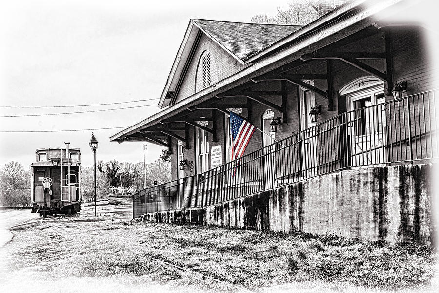 Train Depot Selective Color Flag Photograph by Sharon Popek