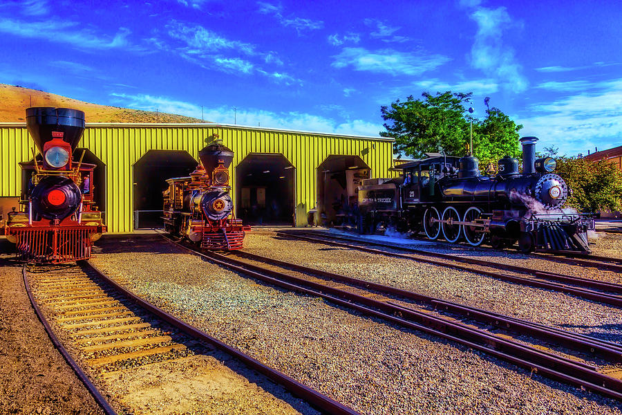 Trains Leaving The Train Barn Photograph by Garry Gay