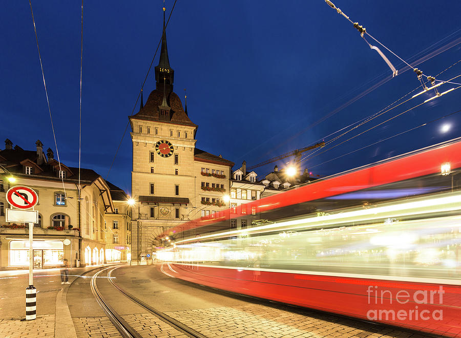 Tram rush at night in Bern old town in Switzerland Photograph by Didier Marti