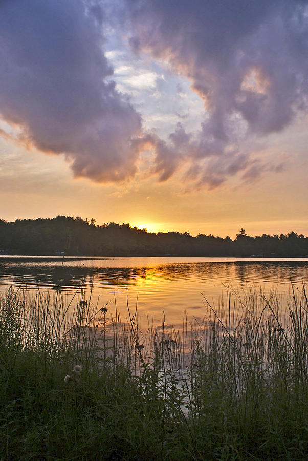 Tranquil sunset on the lake Photograph by Gary Eason