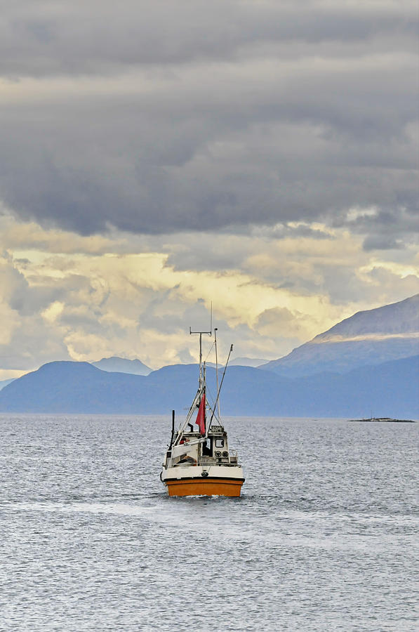 Trawler crossing a fjord in norhern Norway Photograph by Ulrich Kunst And Bettina Scheidulin
