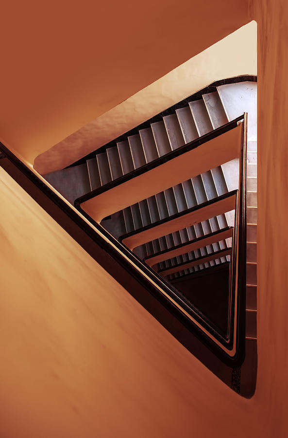 Triangle staircase in orange and red tones Photograph by Jaroslaw Blaminsky