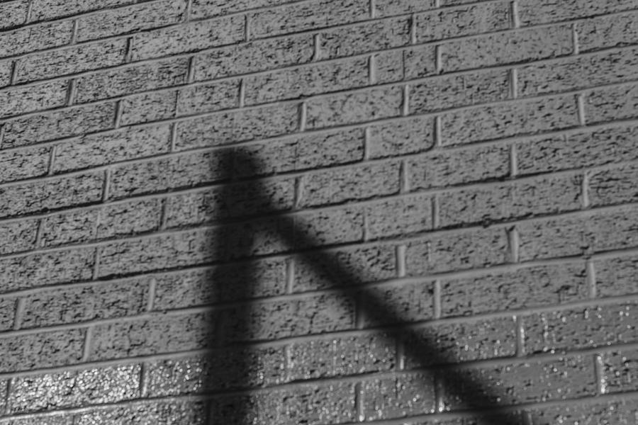 Triangular Shadow Photograph by Claire Doherty