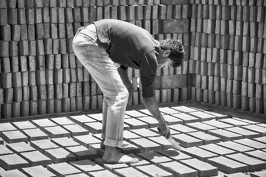 Trimming the Brick Photograph by Hugh Smith