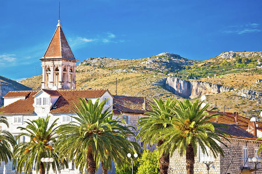 Trogir landmarks and mountain cliffs background Photograph by Brch Photography