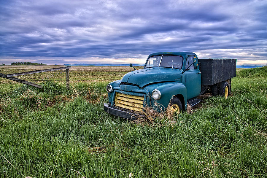 Truck parked forever Photograph by Bill Cubitt