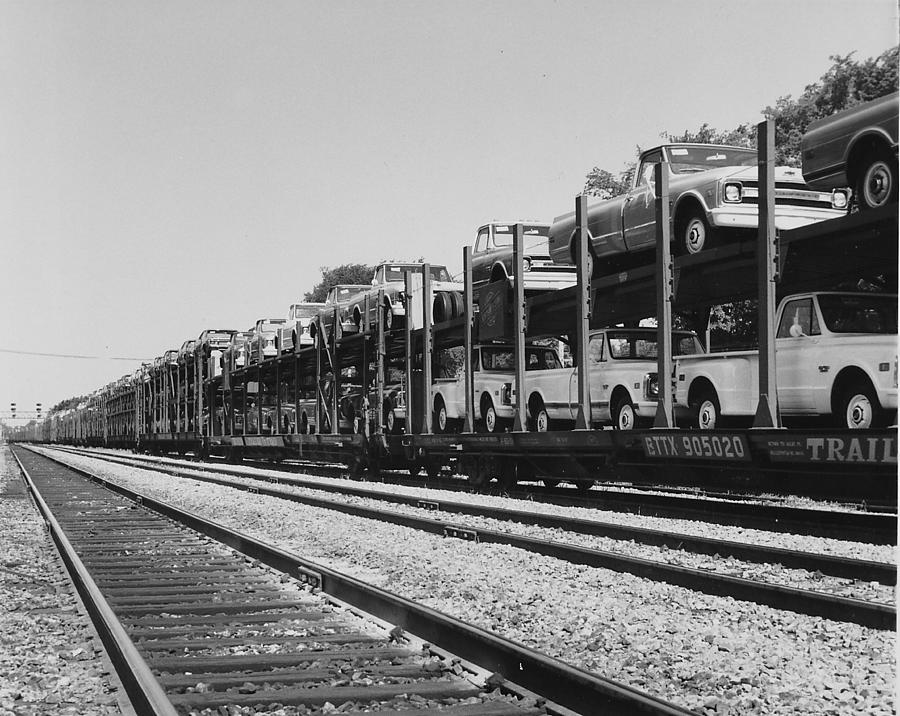 Trucks Carried on Train Auto Rack Photograph by Chicago and North Western Historical Society