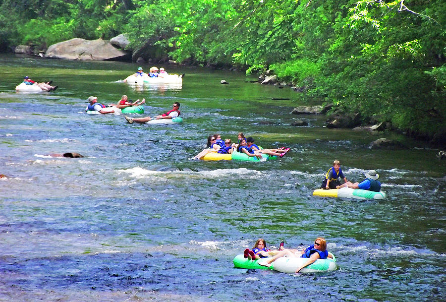 Tubing down the French Broad River Photograph by Duane McCullough