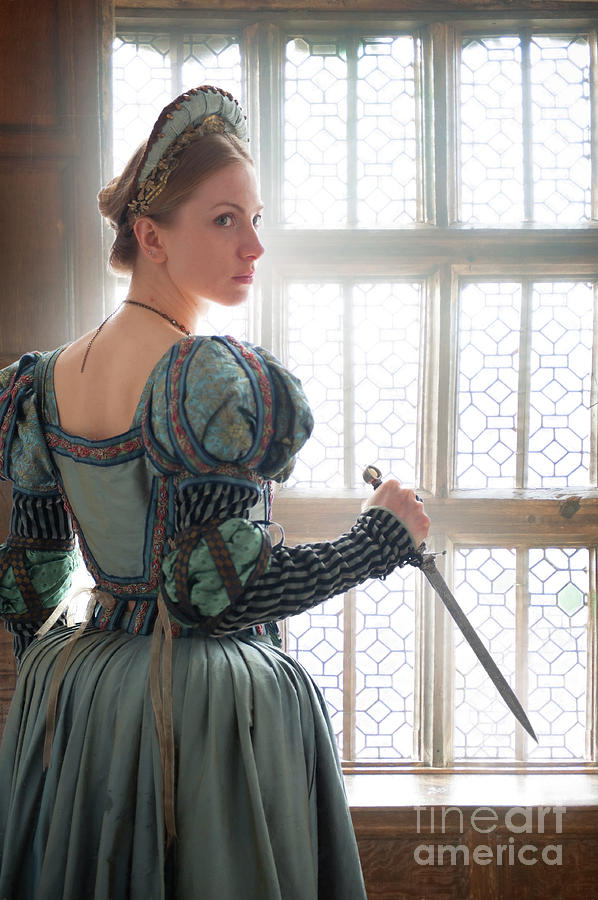 Tudor Woman At The Window Holding A Dagger Photograph by Lee Avison