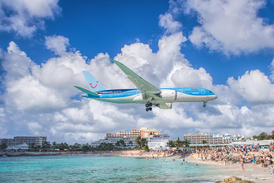 TUI Airlines Netherlands landing at St. Maarten airport Photograph by David Gleeson