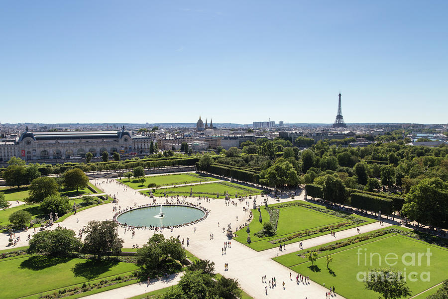 Tuileries garden and Eiffel tower in Paris, France Photograph by Didier Marti