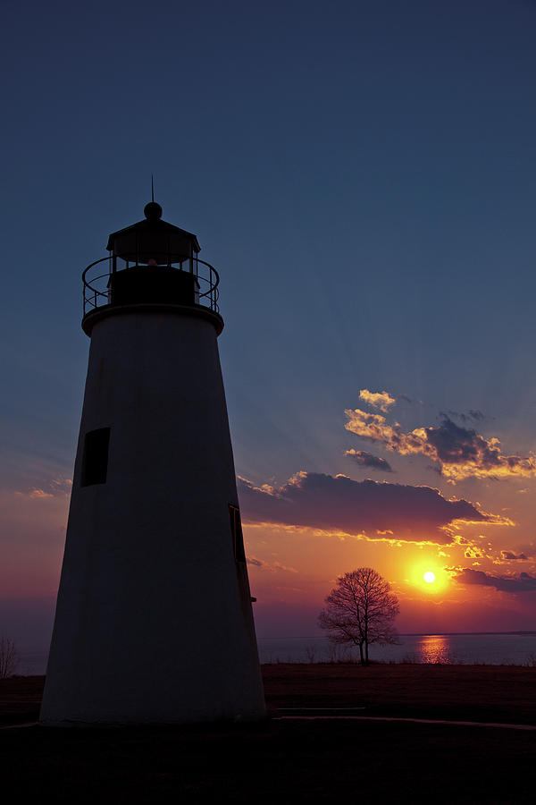 Sunset Photograph - Turkey Point Lighthouse by Benjamin DeHaven