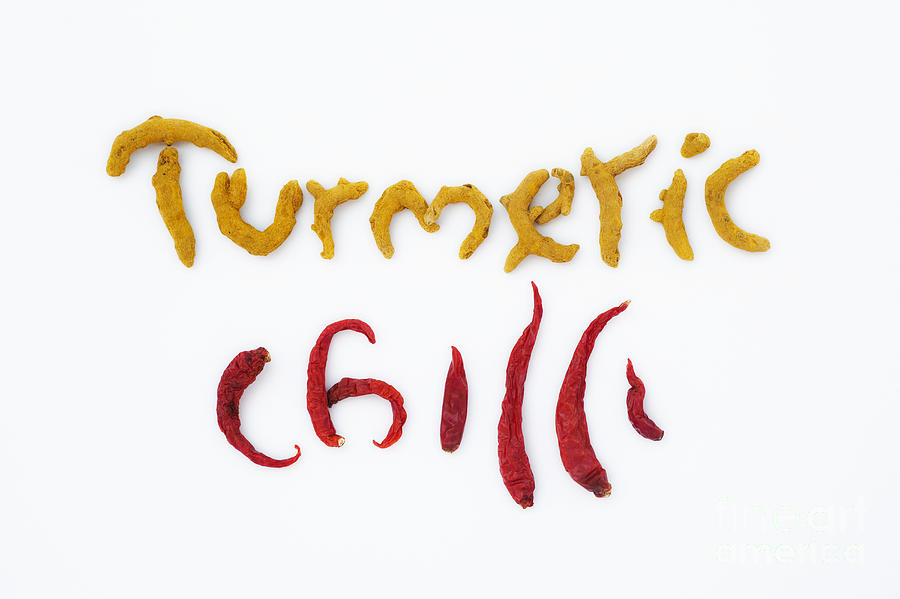 Turmeric and Chilli Photograph by Tim Gainey
