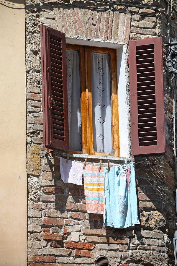 Tuscan Window and Laundry Photograph by Nadine Rippelmeyer