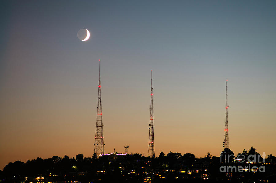 TV towers at Sunset with Crescent Moon  Photograph by Jim Corwin