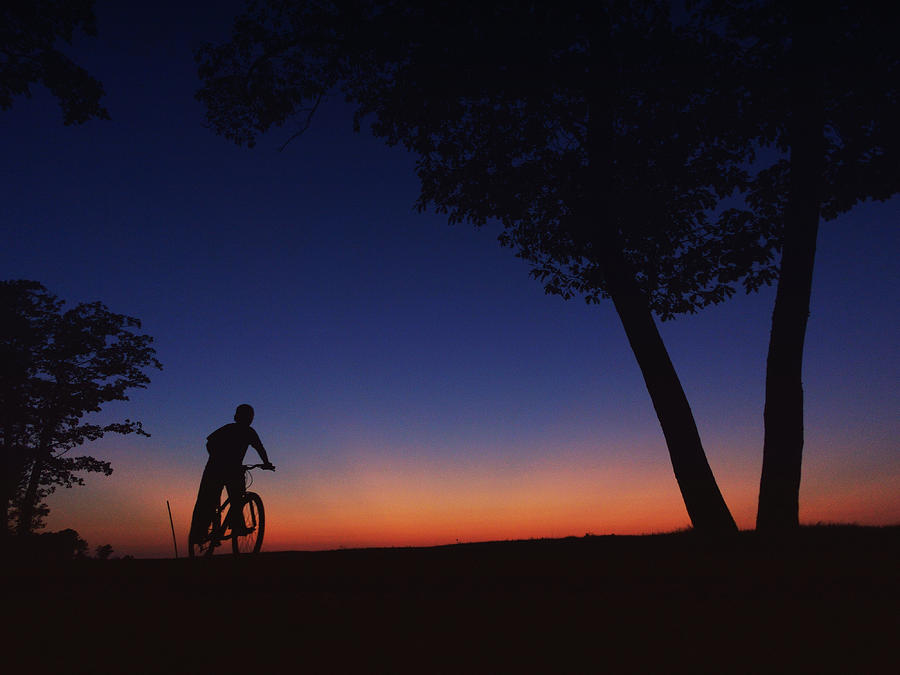 Twilight Bike Ride Photograph by Hermes Fine Art