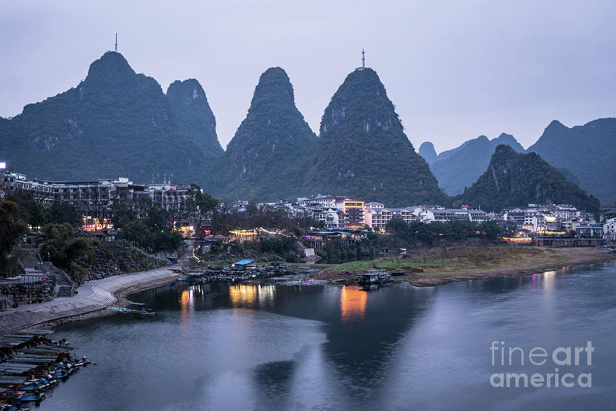 Twilight over the Lijang river in Yangshuo Photograph by Didier Marti