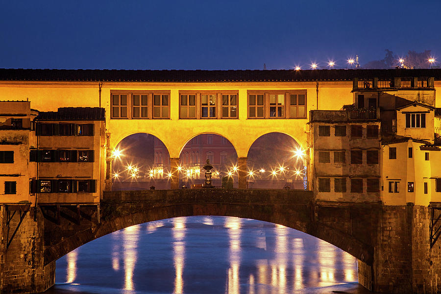 Twilight over the Ponte Vecchio Photograph by Andrew Soundarajan