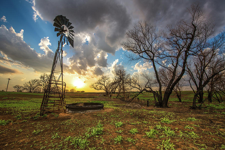 Sunset Photograph - Twilight - Windmill and Sunset After Prairie Fire in Southern Kansas by Southern Plains Photography