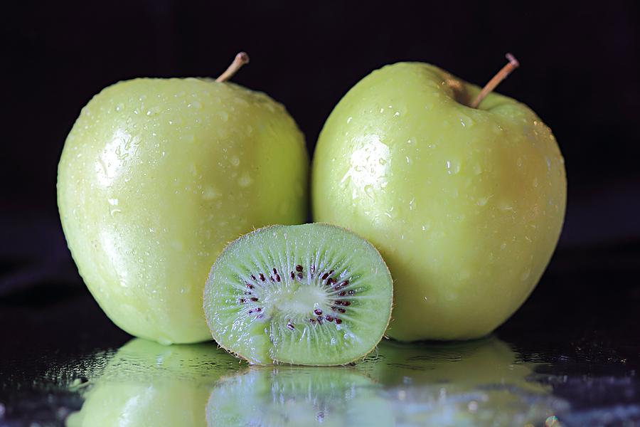 Two Apples and a Kiwi Photograph by Angela Murdock