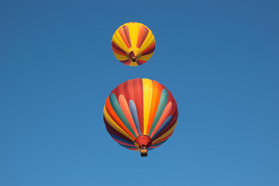 Transportation Photograph - Two Balloons passing over by Jeff Swan