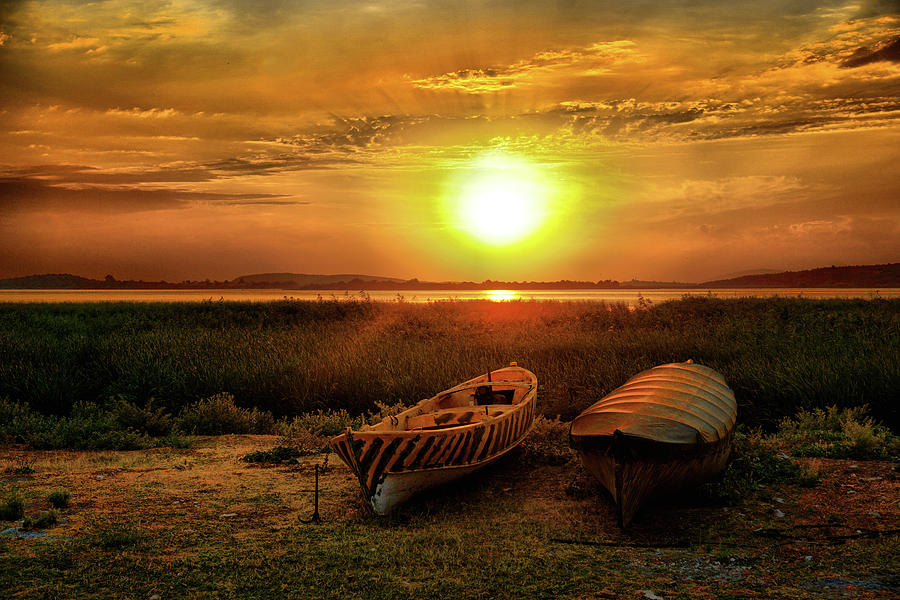 Two boats and sunset Photograph by Lilia S