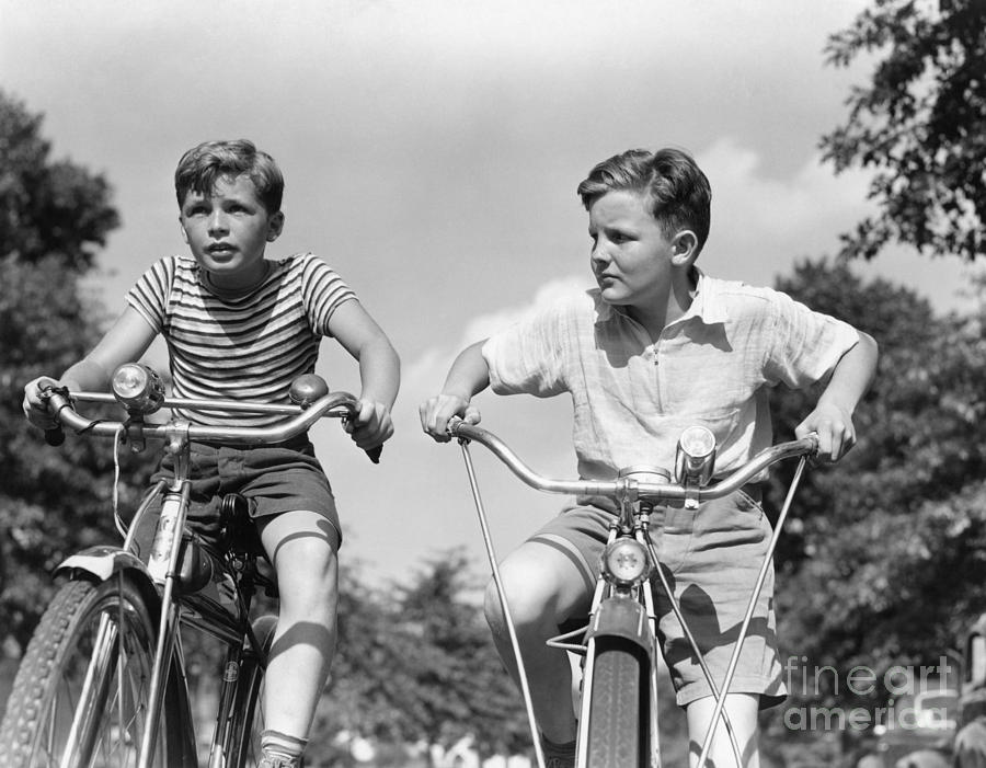 Two Boys Racing Bicycles, C.1930-40s Photograph by H. Armstrong Roberts ...