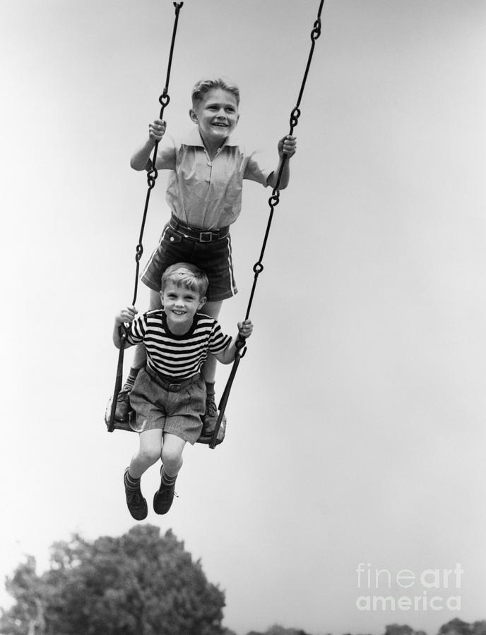 Two Boys Sharing A Swing, C.1930s Photograph by H. Armstrong Roberts ...