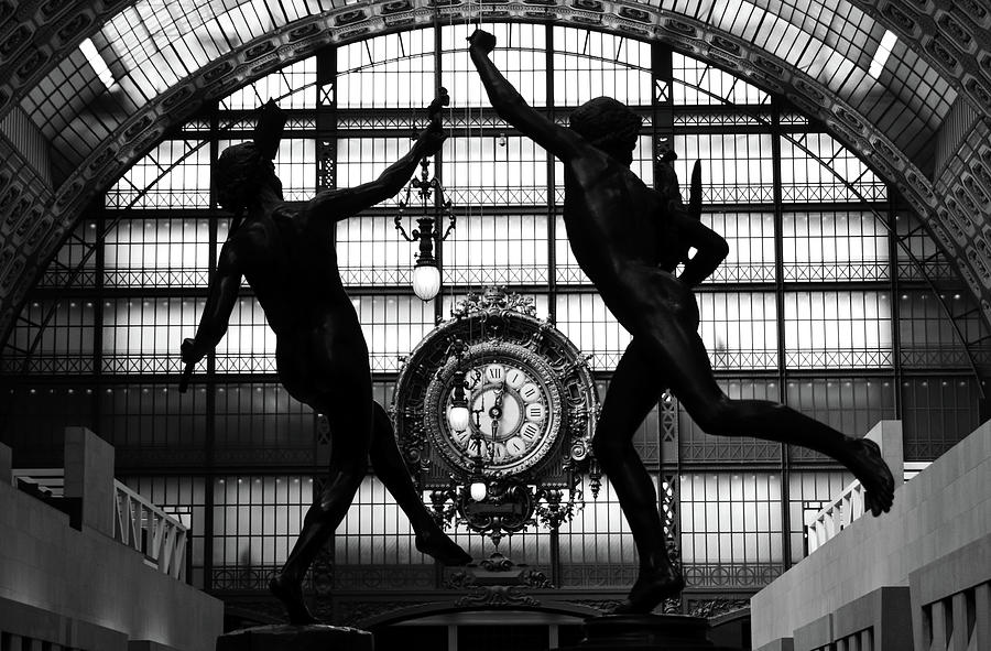 Two bronze sculptures framing great Gold Clock Orsay Museum Great Hall Paris France Black and White Photograph by Shawn OBrien