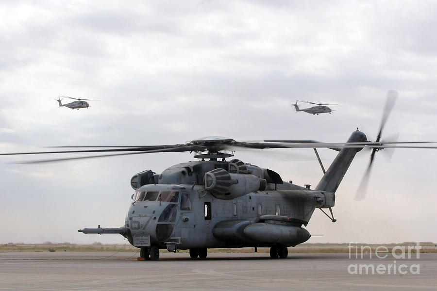 Helicopter Photograph - Two Ch-53e Super Stallion Helicopters by Stocktrek Images