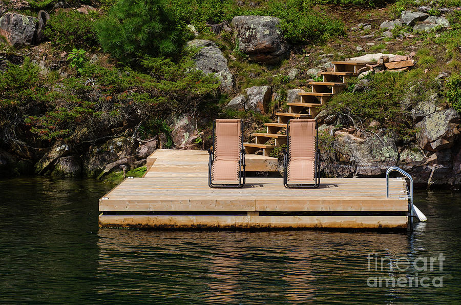 Two chairs on the dock Photograph by Les Palenik