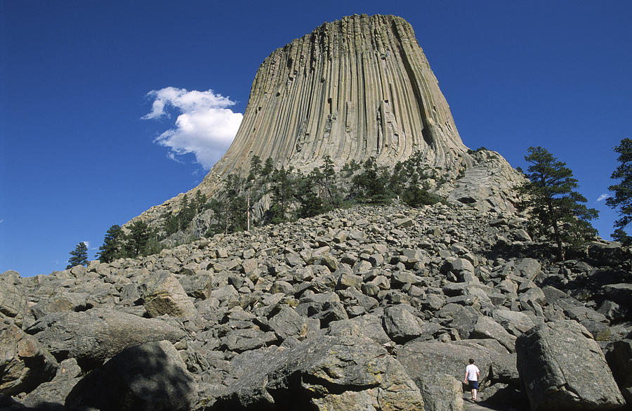 Two Children Climb Up To Devils Tower Photograph by Joel Sartore