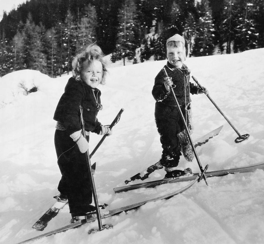 Two Children Skiing Photograph by Underwood Archives