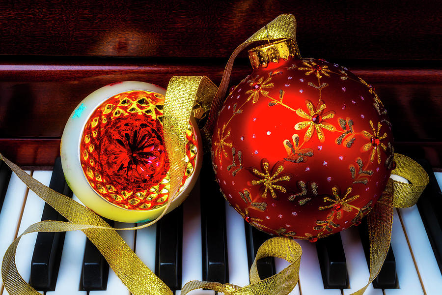 Two Christmas Ornaments On Piano Photograph by Garry Gay