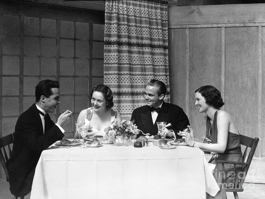 Two Couples Dining In Formal Attire Photograph by H. Armstrong Roberts/ClassicStock