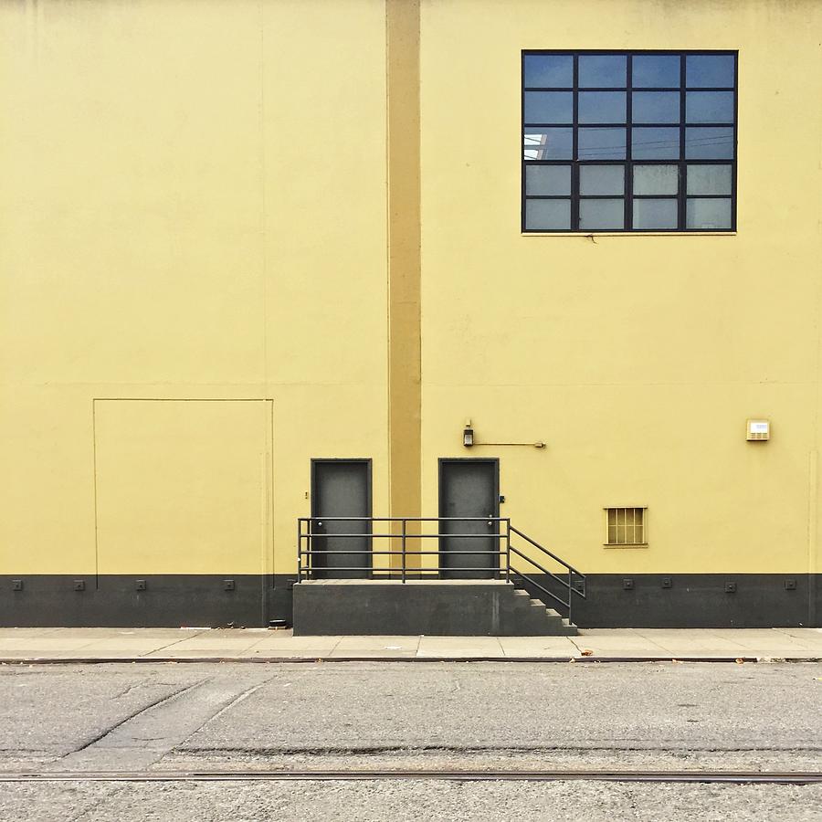 Two Doors In Yellow Wall Photograph by Julie Gebhardt