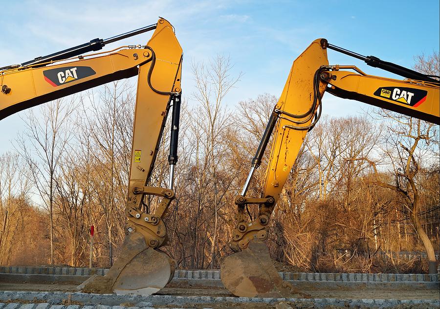 Truck Photograph - Two Excavators on the Construction Site by Andrea Rea