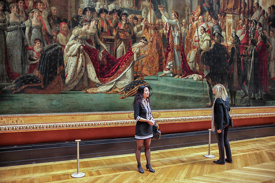 Two female tourists in front of The Coronation of Napoleon  Photograph by Patricia Hofmeester