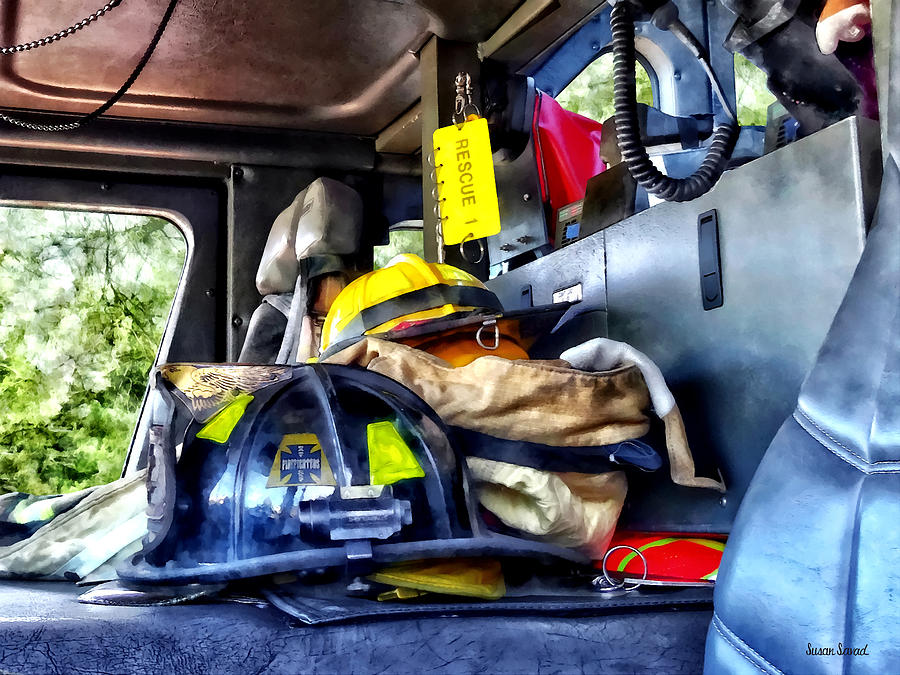 Two Firefighters Helmets Inside Fire Truck Photograph by Susan Savad