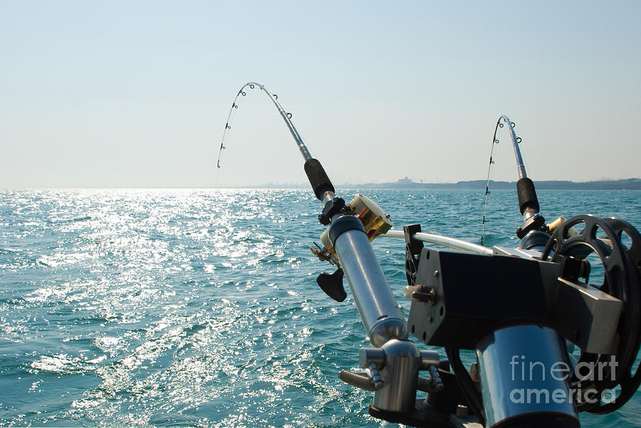 Lake Michigan Photograph - Two Fishing Rods on Back of Boat by Paul Velgos