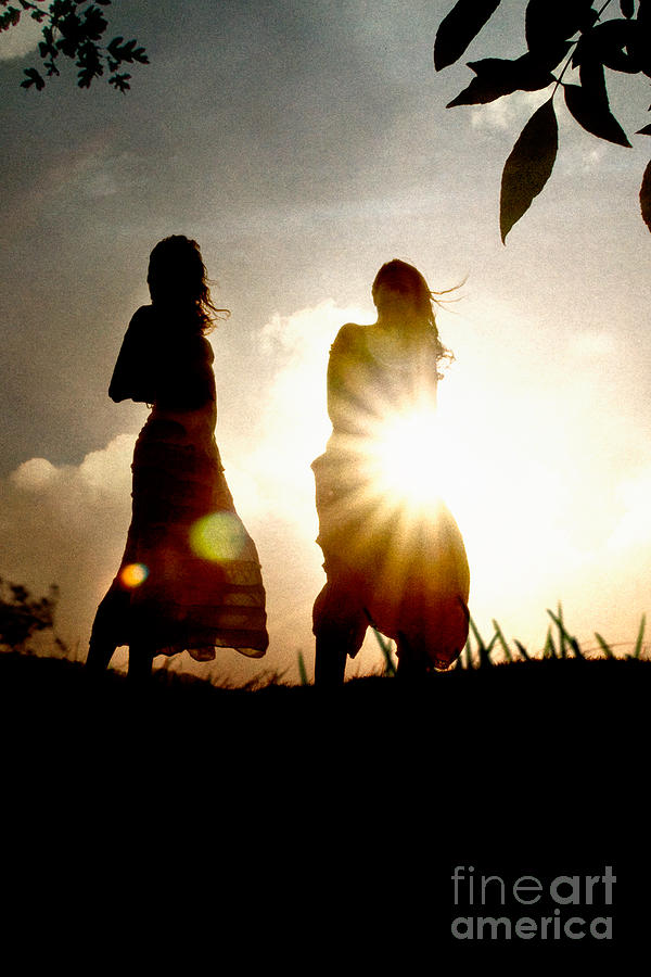 Two girls and sunburst Photograph by Clayton Bastiani